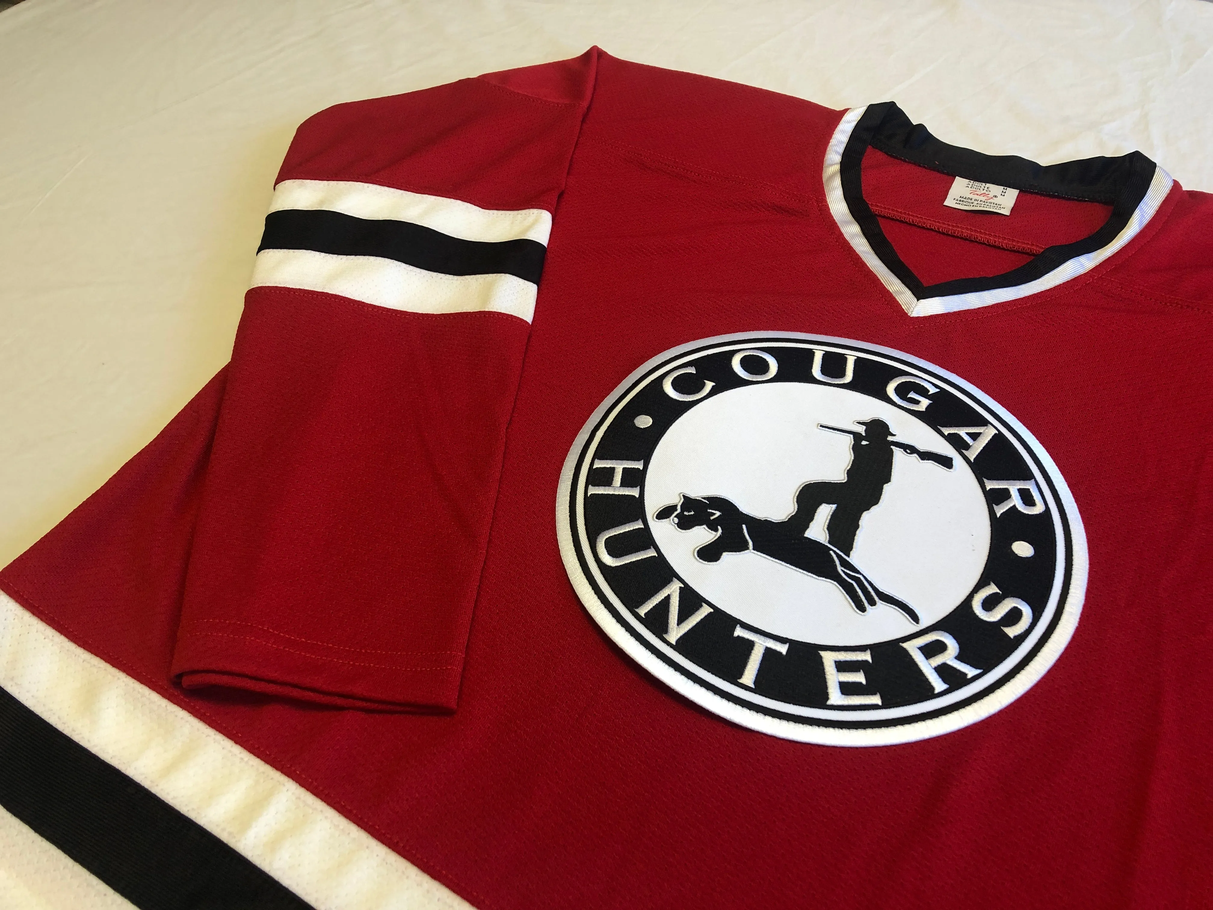 Custom Hockey Jerseys with the Cougar Hunters Twill Logo