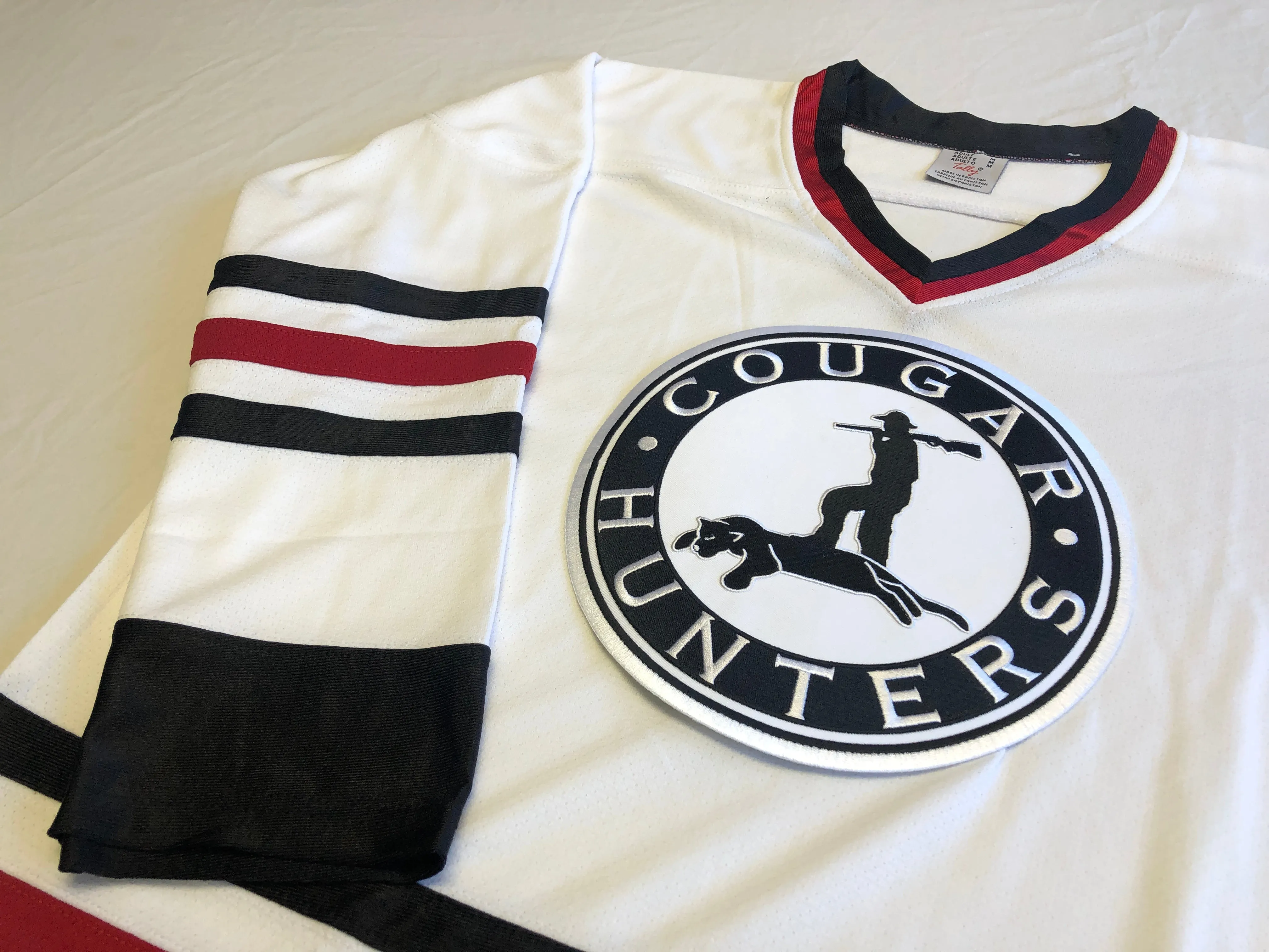 Custom Hockey Jerseys with the Cougar Hunters Twill Logo